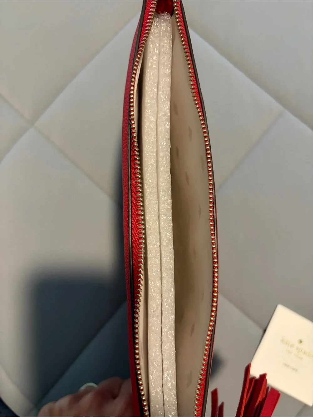 kate spade Red Pebbled Leather Tassel Wristlet Clutch